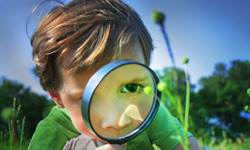 Boy With Magnifying Glass